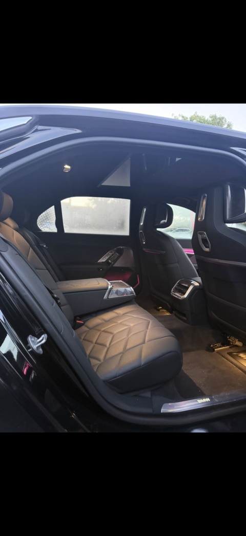 BMW i7 chauffeur service luxury rear passenger seating and interior